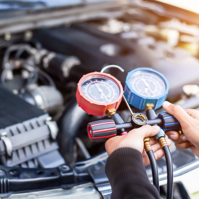 mechanic working on car
