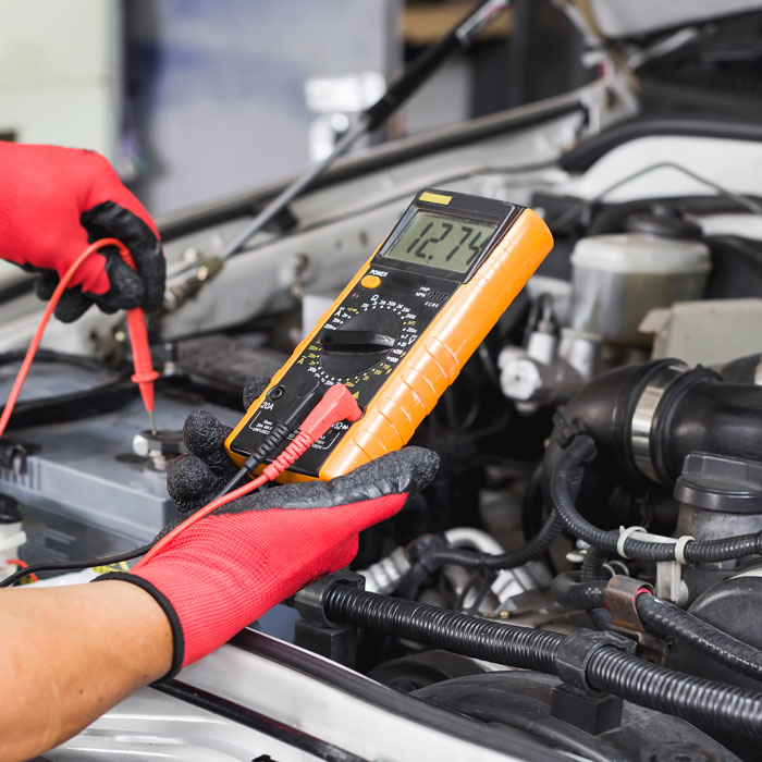 mechanic working on car