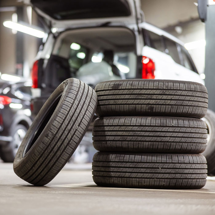 stack of tires on shop floor