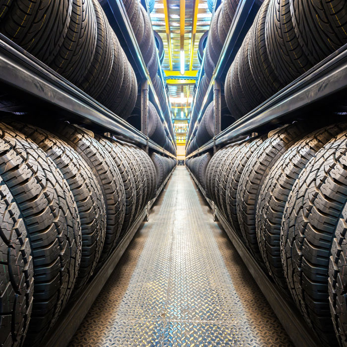 aisle with shelves of tires